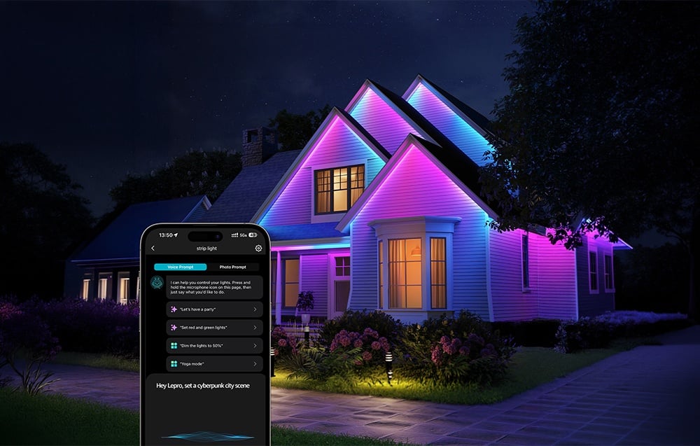 A smartphone in front of a house illuminated with purple lights.