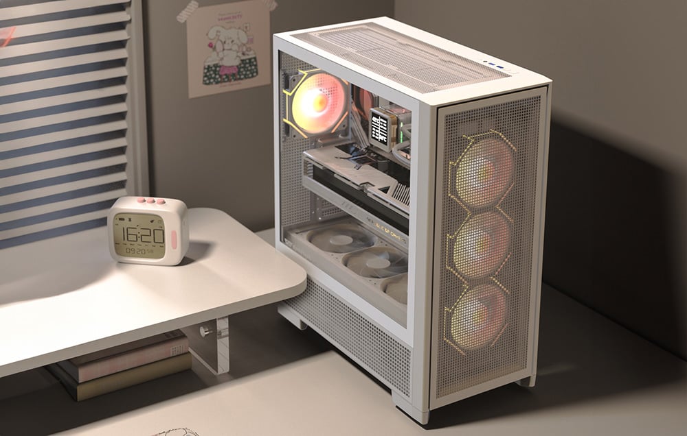 White computer case with colorful fans on a light-colored desk next to a clock