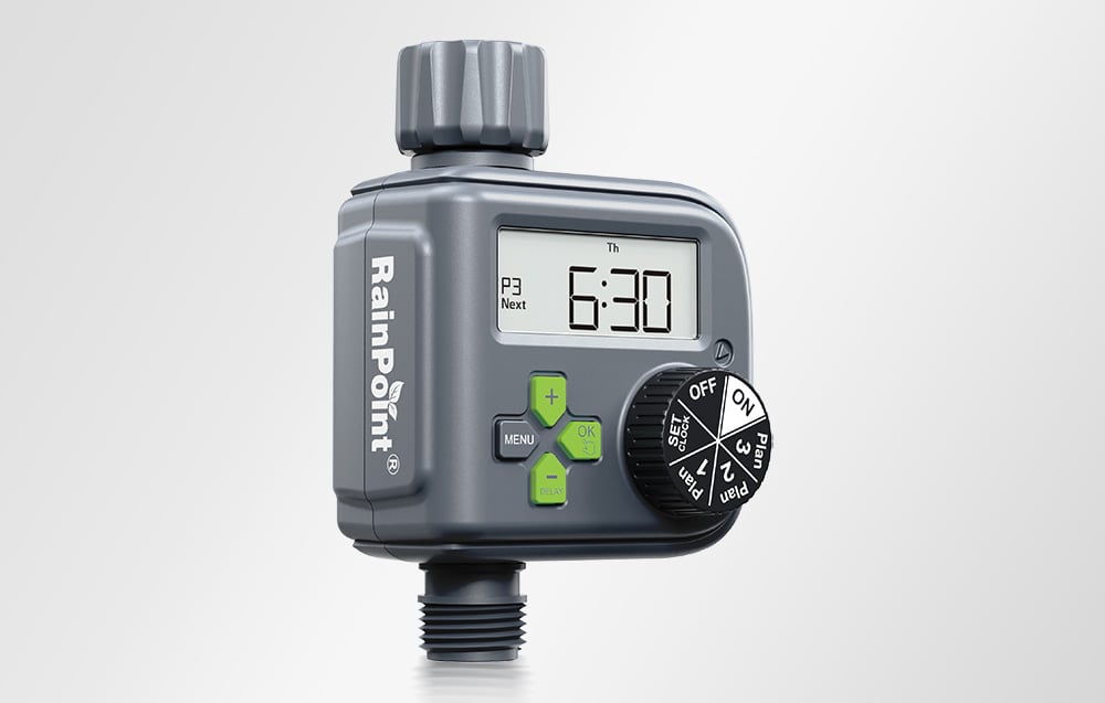 A graphite-colored RainPoint® irrigation controller with visible green buttons and a program selection dial on a light gray background