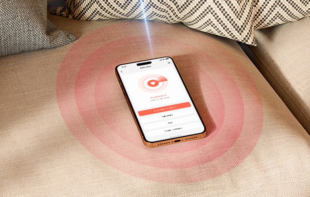 Smartphone lying on the couch with the smart home control app open