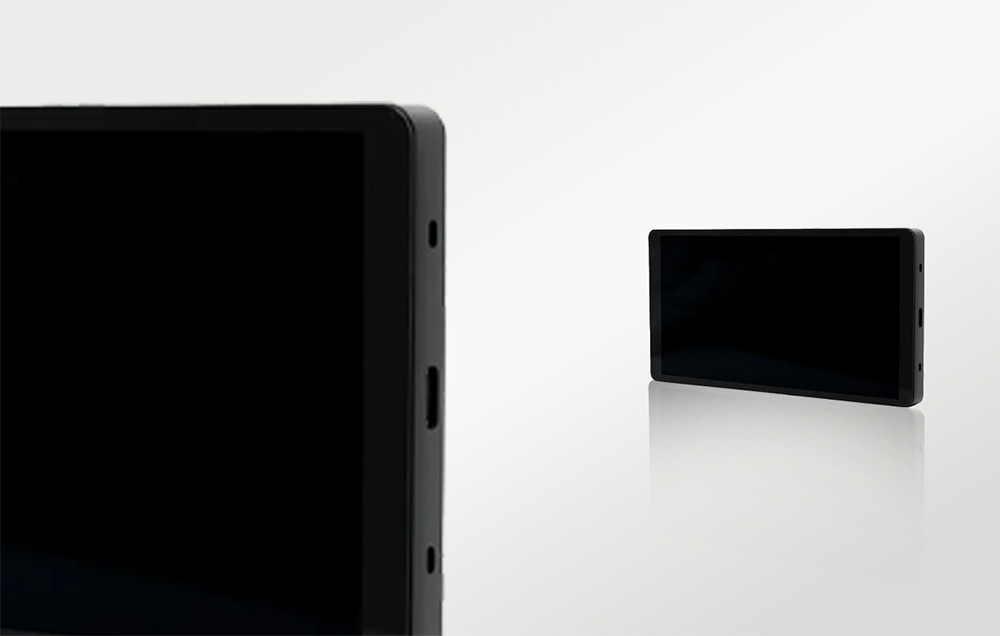Close-up of the slim side profile of the Shelly X2i panel, showing the USB-C port and minimalist housing.