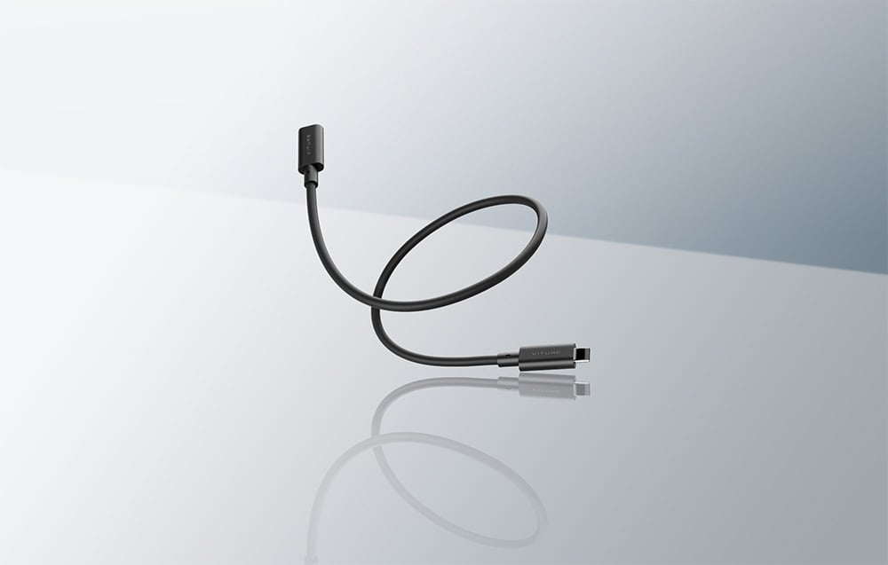 VITURE's black USB-C cable floats above a mirrored, light gray surface