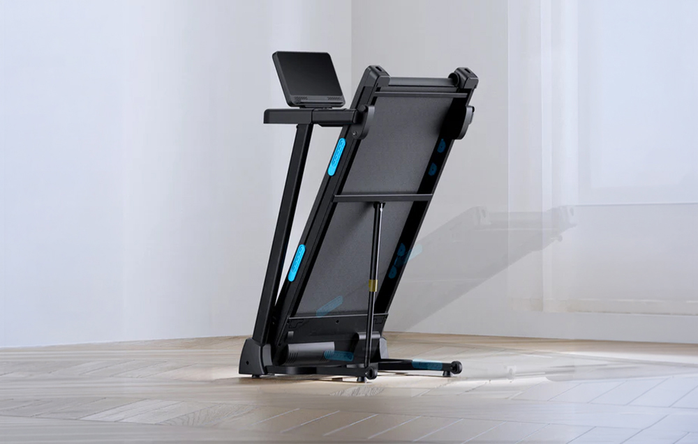 Merach treadmill folded vertically to save space