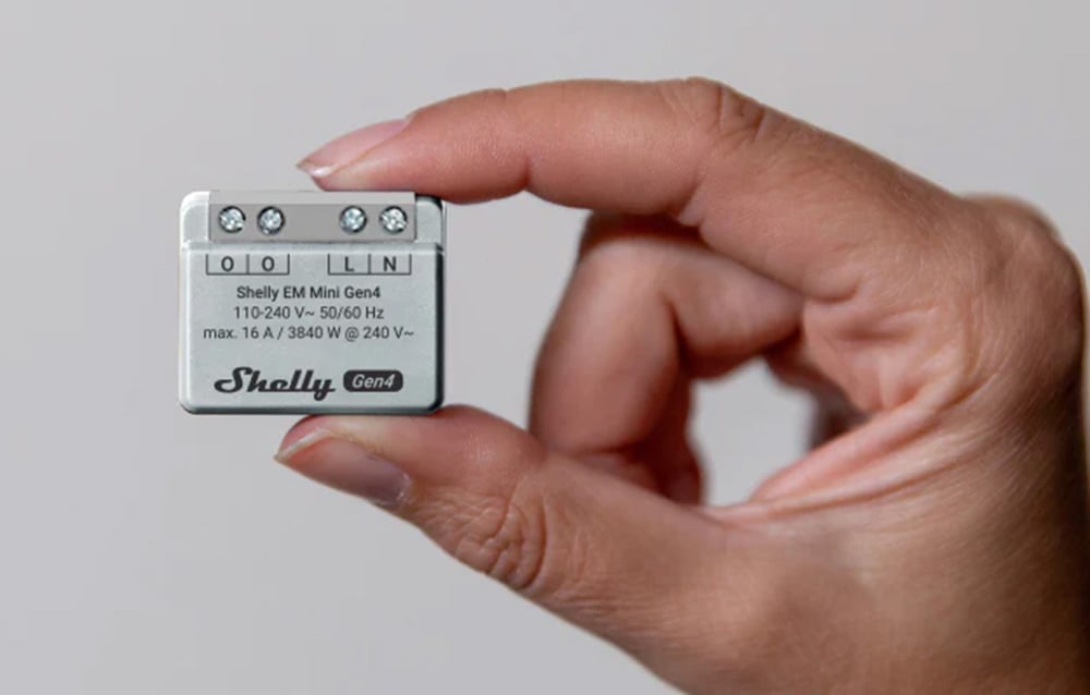 Shelly small energy meter held in hand