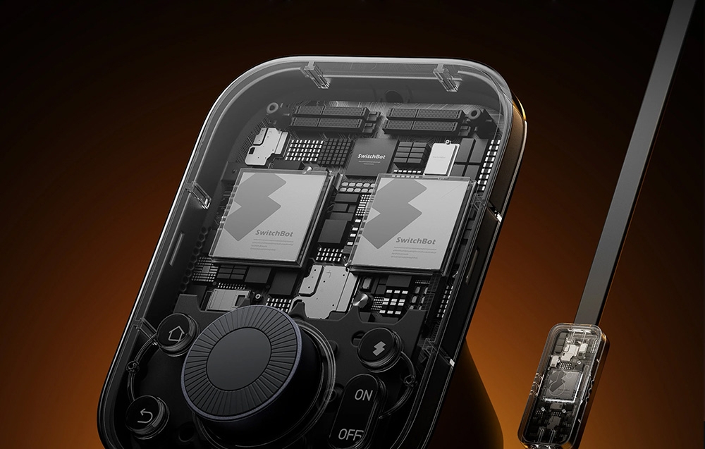 SwitchBot remote control interior with visible processor chips and advanced electronics