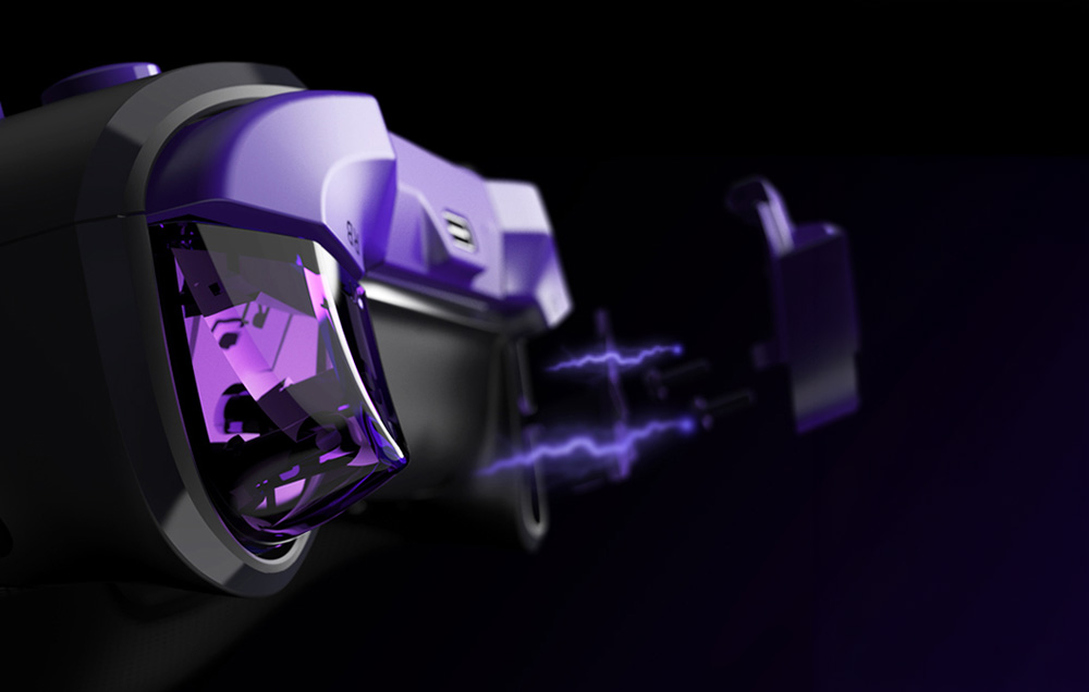 Side view of the trigger and side button on the purple-and-black controller with bursting purple shards