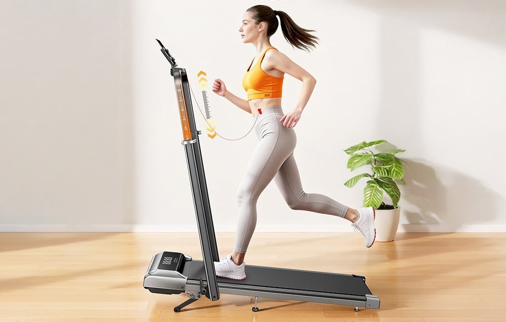 A woman in athletic attire with dark, tied-back hair is running on a treadmill in a bright room