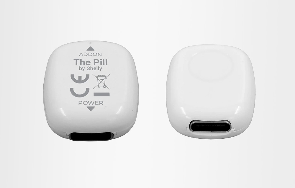 Universal Shelly The Pill sensor visible from the front and back on a white background