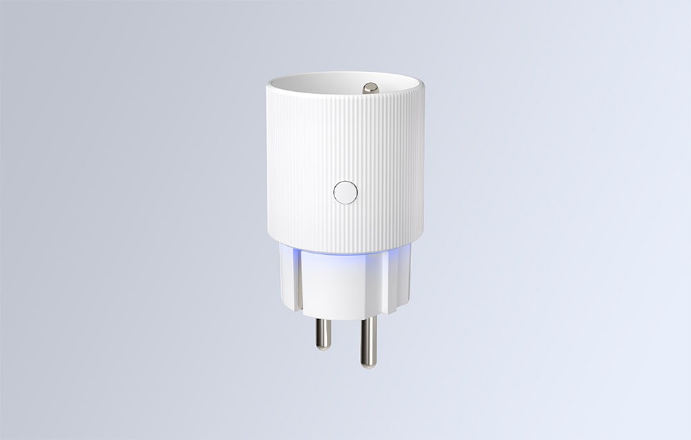 A white smart plug with LED backlighting on a light background.