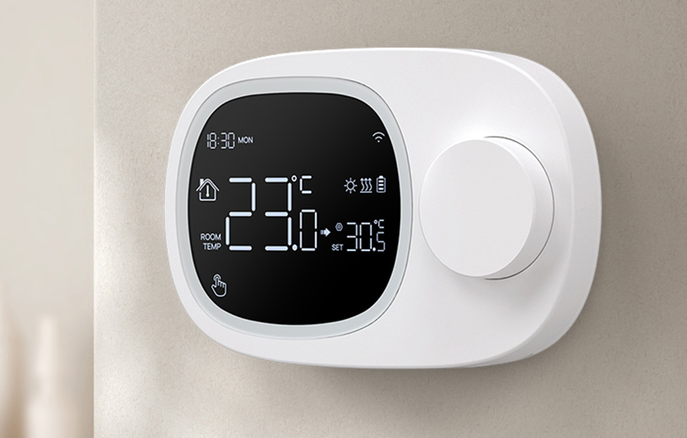 Smart thermostat on bright wall