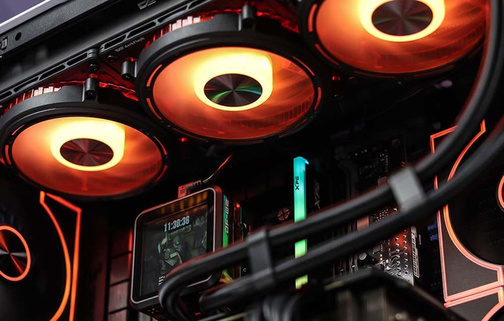 Computer interior with three illuminated fans