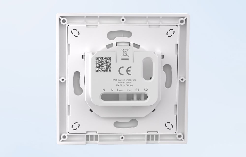 The back side of a white switch on a light background.
