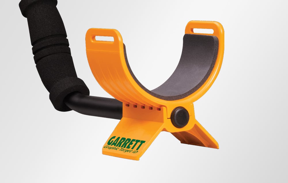 Close-up of the orange armrest of the metal detector.