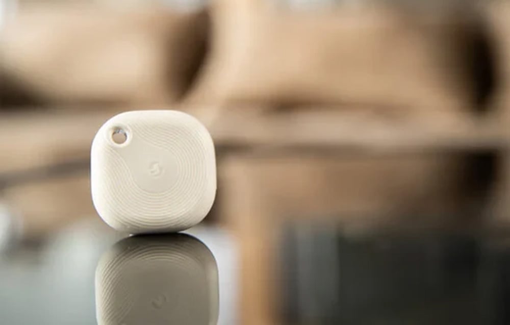 Bright activation button placed on a dark table