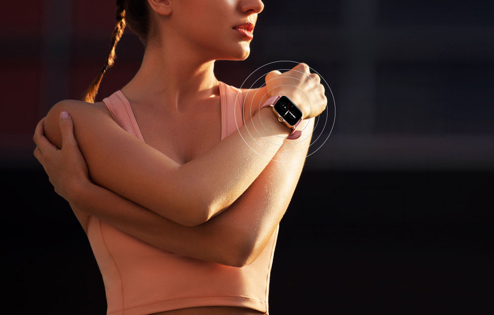 A woman in a sports top working out, with a pink smartwatch on her wrist surrounded by wave graphics