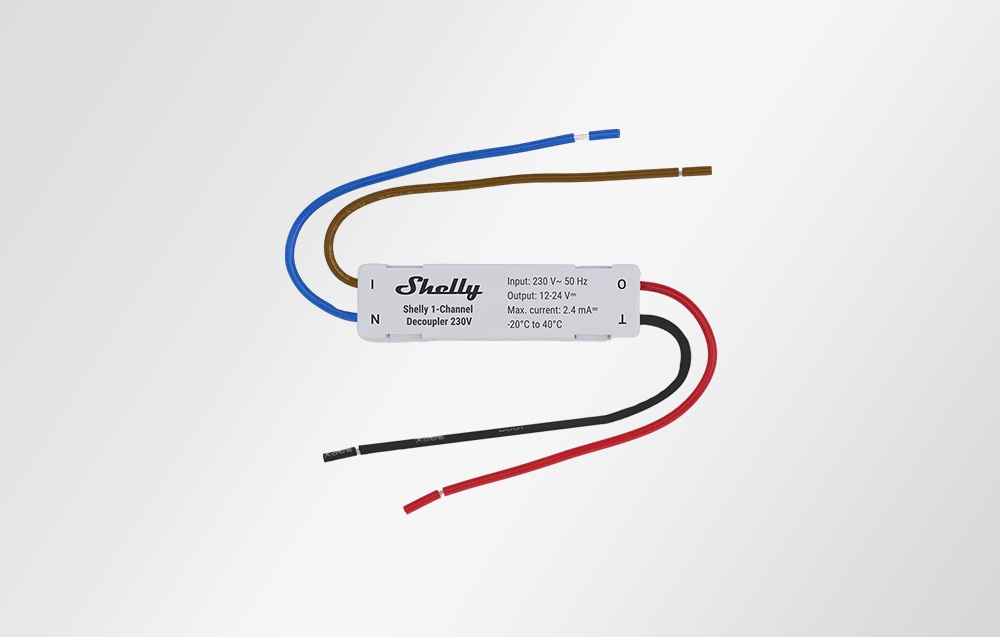 Shelly 1-Channel Decoupler module with wires laid out in a loop, shown on a white background
