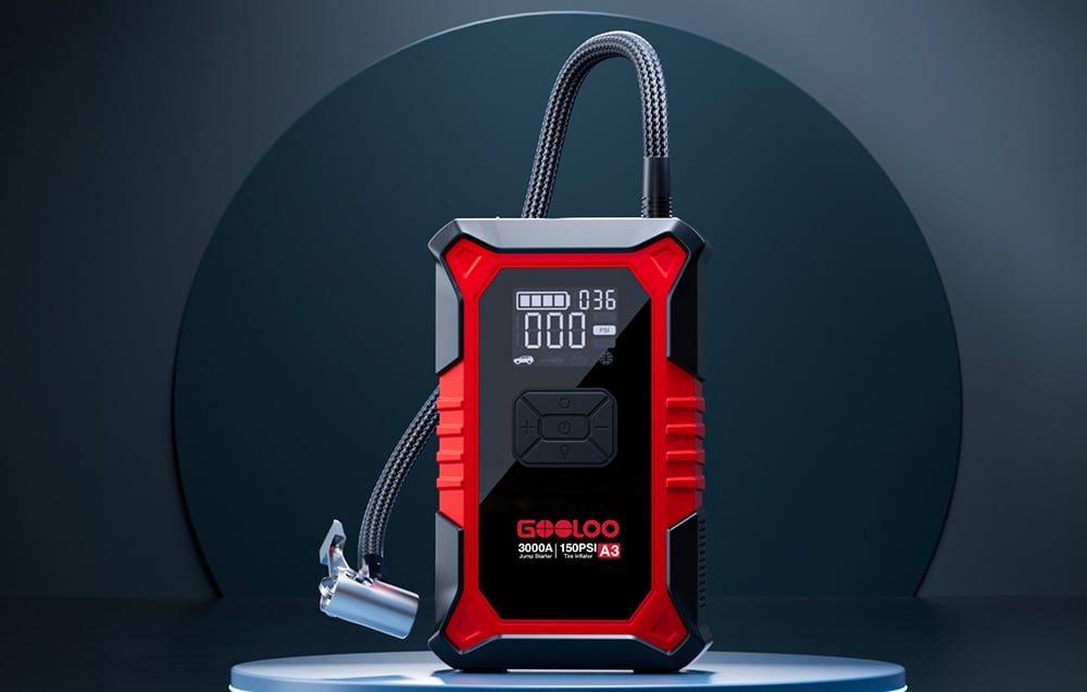 Portable Gooloo A3 jump starter with a hose for inflating tires stands on a blue platform