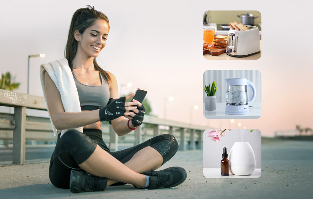 woman dressed casually with a phone in her hand controlling devices in the house - toaster, kettle, and humidifier