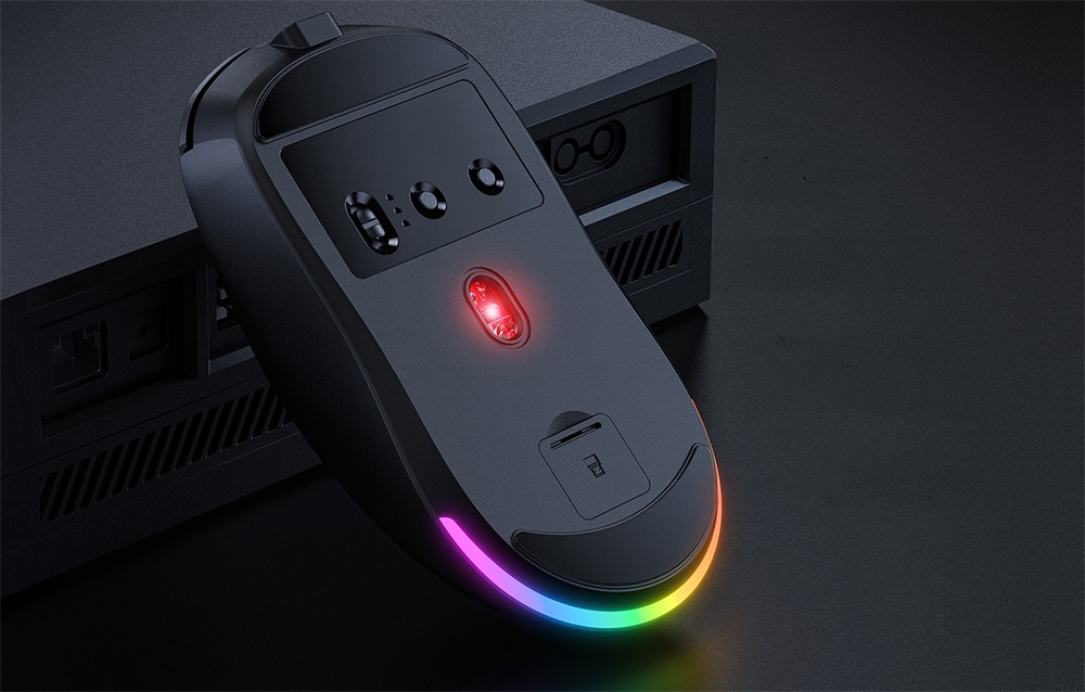 Black computer mouse with backlighting and buttons on a dark background