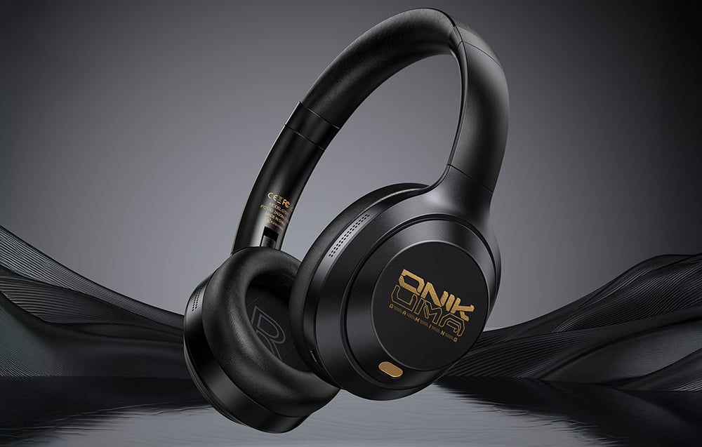 Black Onikuma headphones against the background of a dark lake