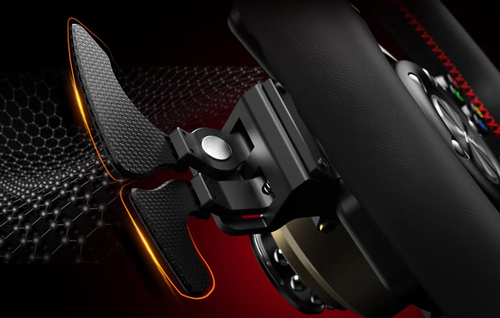 Close-up of the gaming steering wheel shift paddles.