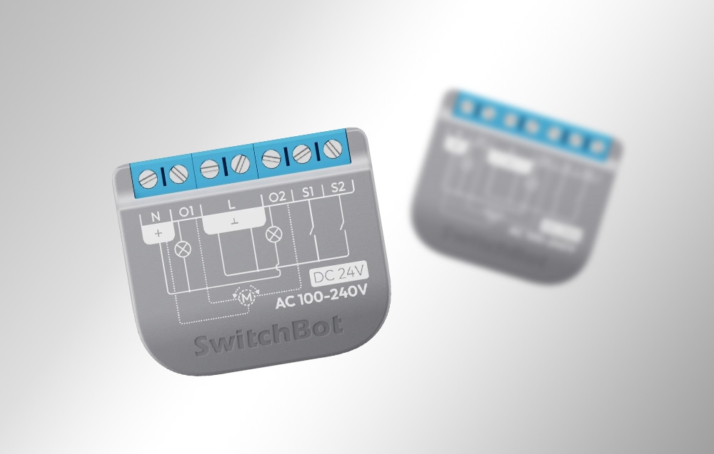 Two SwitchBot Relay Switch 2PM modules shown from different perspectives with connectors and wiring diagrams visible