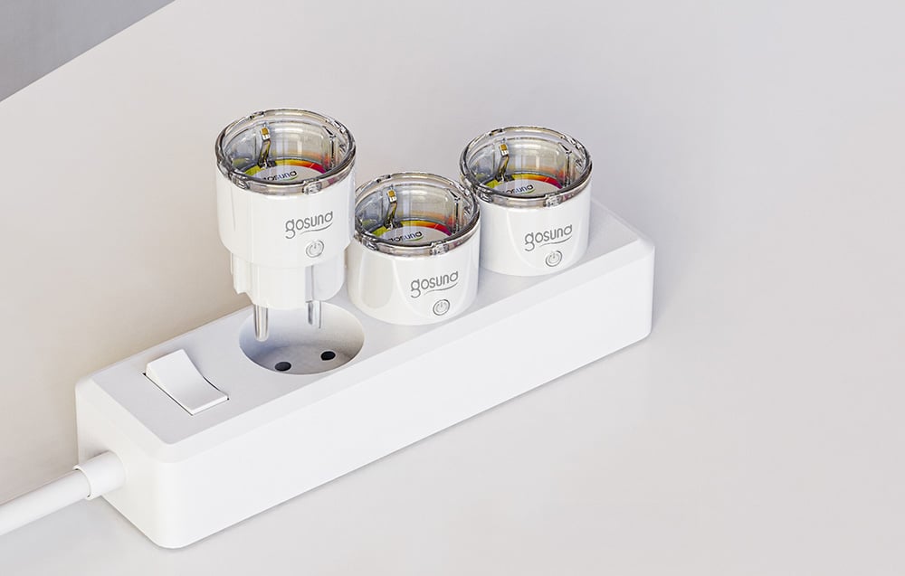 three smart sockets in a white extension cord