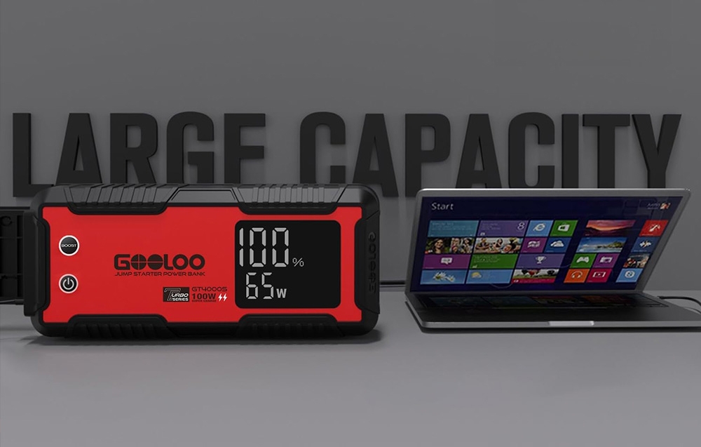 Car starter next to a laptop against a background with the text “LARGE CAPACITY”