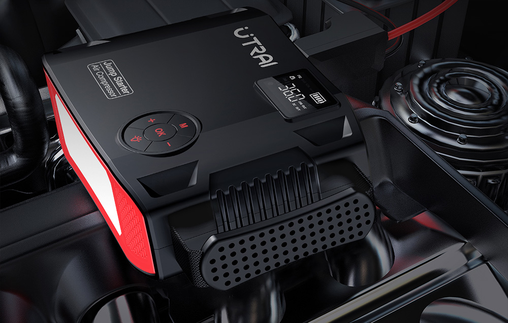 A black multifunctional jump starter with a digital display rests on the open hood of a car.