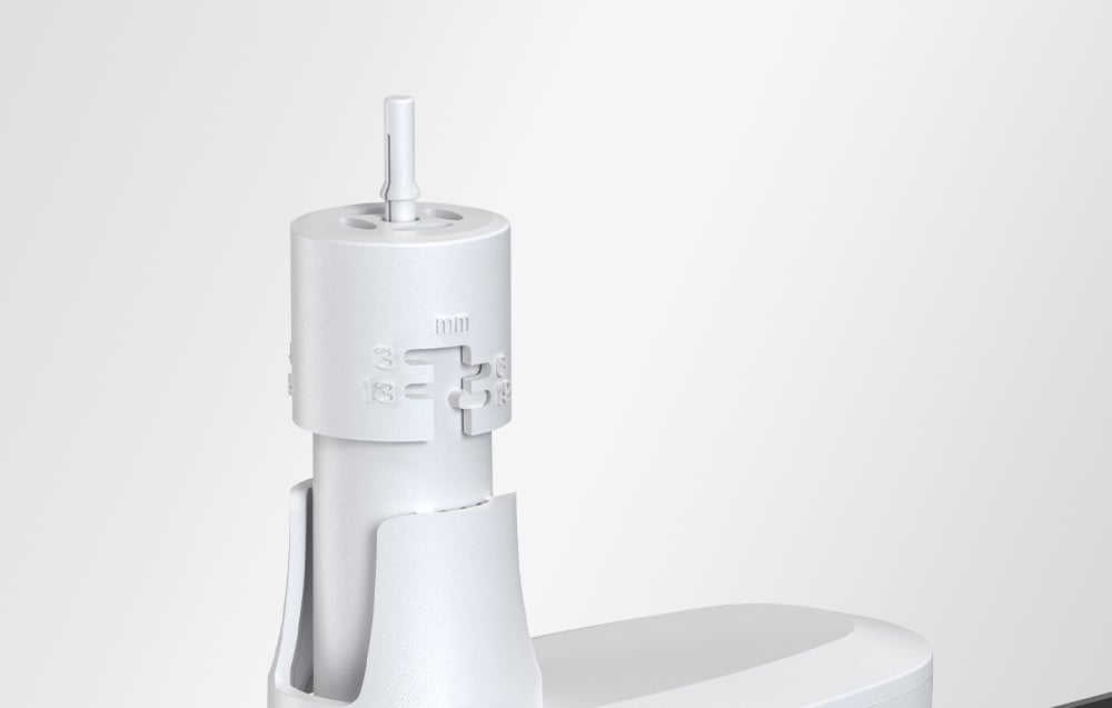 Close-up of the top of the rain sensor with millimeter scale and pin