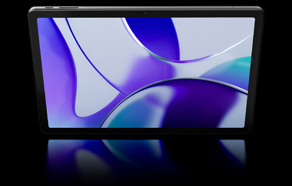 Tablet with abstract wallpaper in purples and blues, frontal view with reflection on black surface