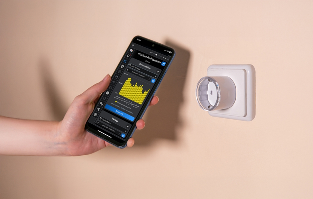 Smartphone app showing energy consumption statistics next to an unplugged Shelly Plug S in an outlet