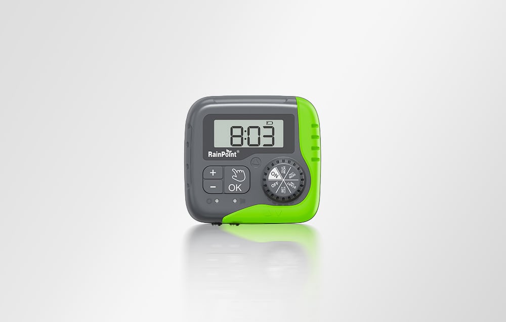 Compact, gray-green RainPoint irrigation controller with an LCD display and a function selection knob