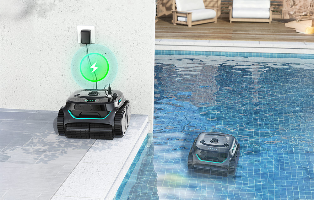 Two black pool robots with turquoise accents, one charging at the edge of the pool with a green lightning bolt icon, the other cleaning the bottom of the pool