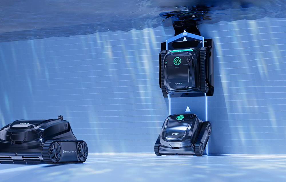 Pool cleaning robot pulling up to a docking station hanging on the wall