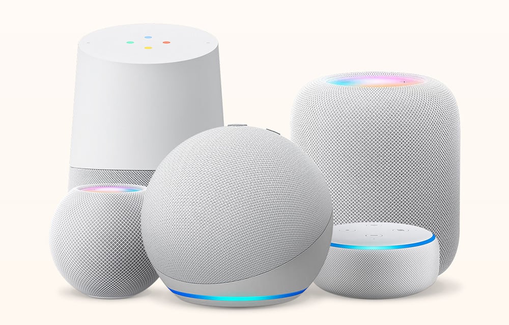 Five different smart speakers with modern design, set together on a bright background