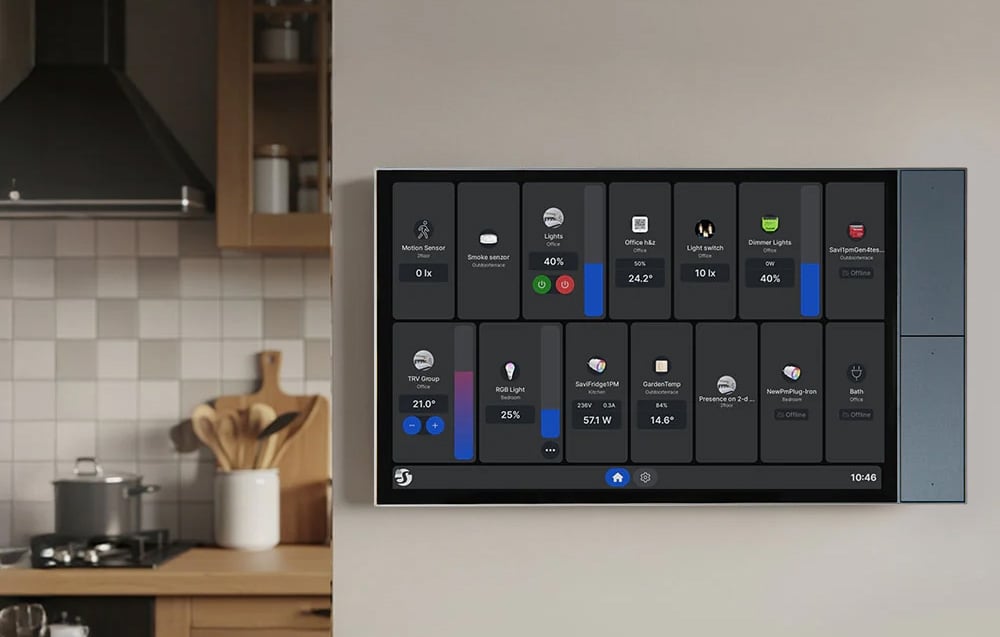 Smart home control panel mounted on the wall at the entrance to the kitchen