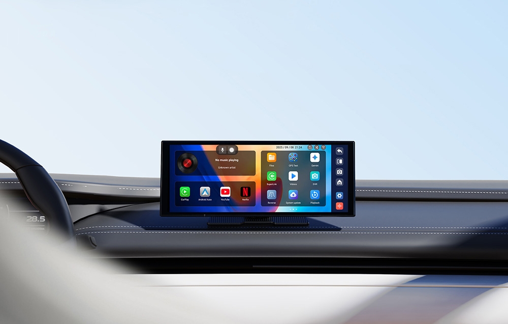 A wide screen with the system interface is mounted centrally on the car’s dark dashboard