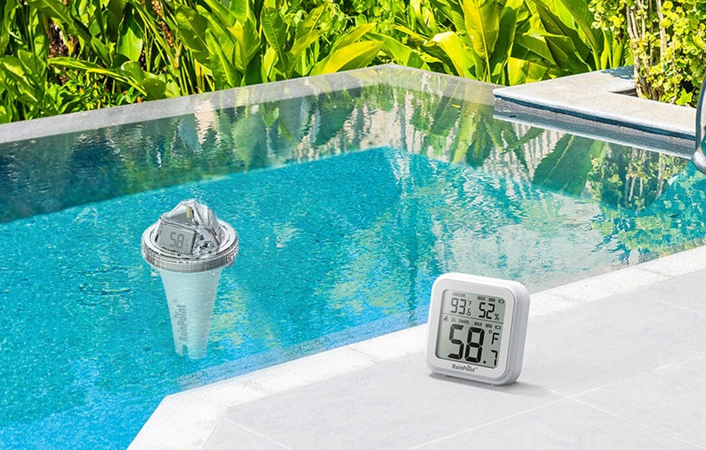Pool thermometer in the backyard pool, with an indoor receiver displaying the temperature nearby