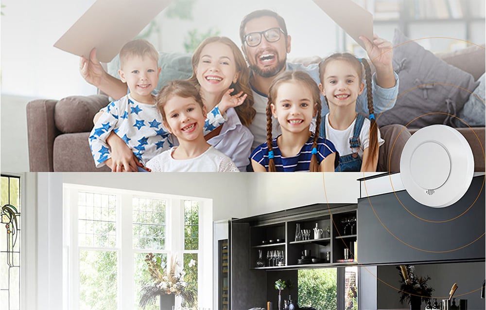 A happy family with children sitting on a sofa under a cardboard roof and a modern kitchen interior with a white smoke detector on the wall