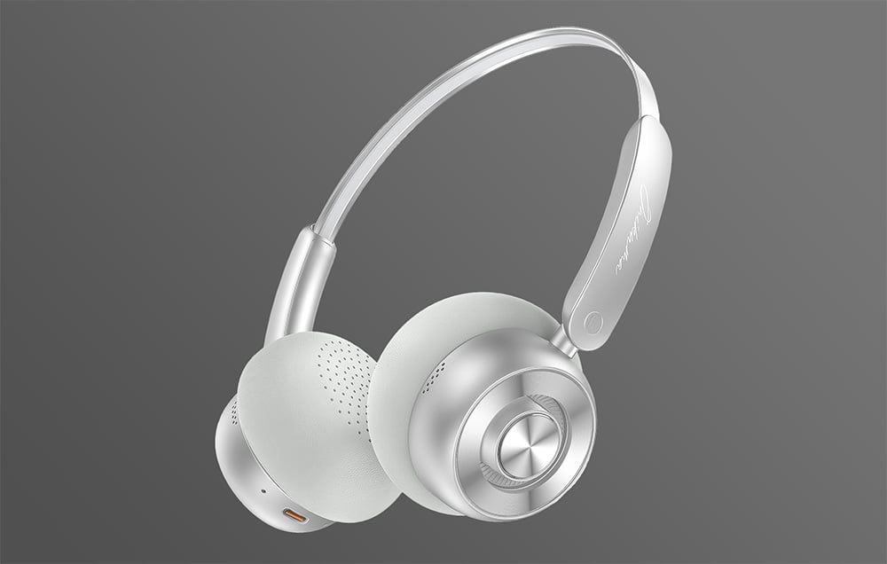 White Onikuma gaming headphones on a gray background