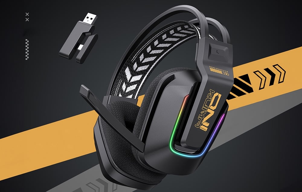 Black gaming headphones with RGB backlighting on graphic background with USB adapter