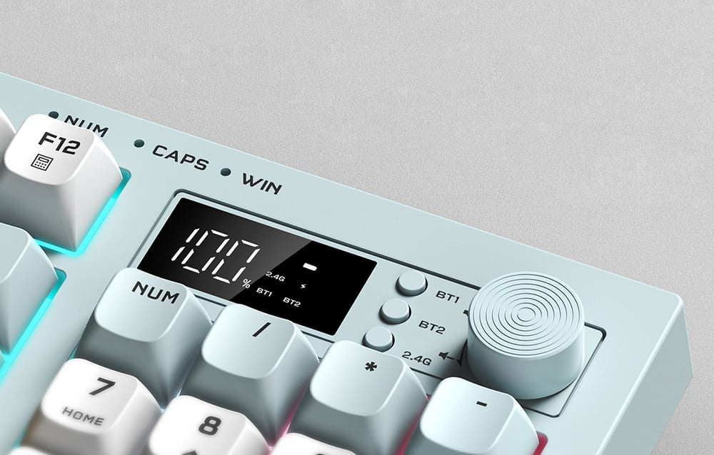 Close-up of screen and dial of bright gaming keyboard