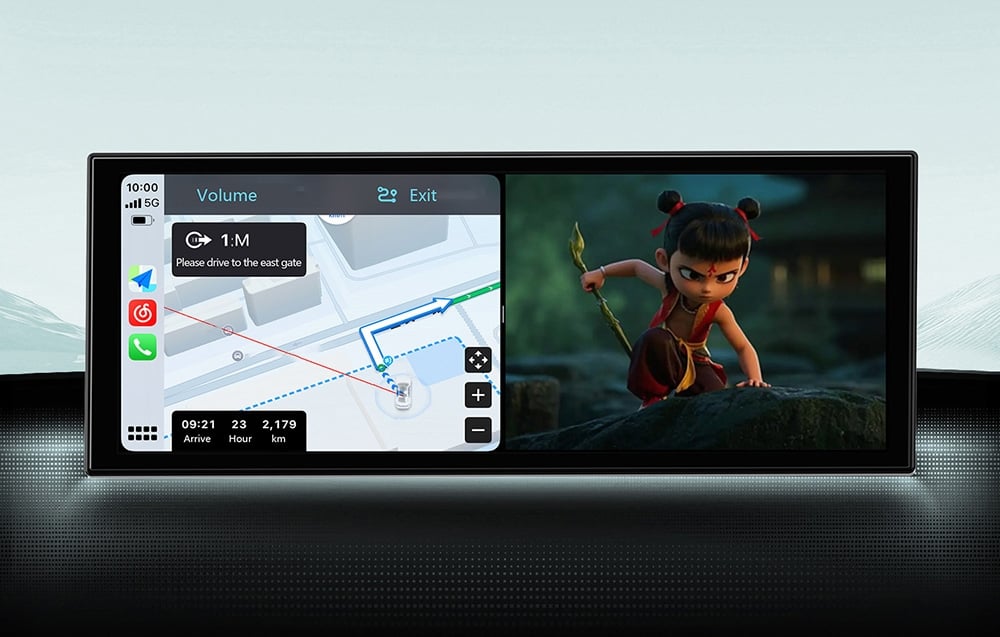 The display, with split-screen functionality, shows GPS navigation and a colorful animation from a fairy tale
