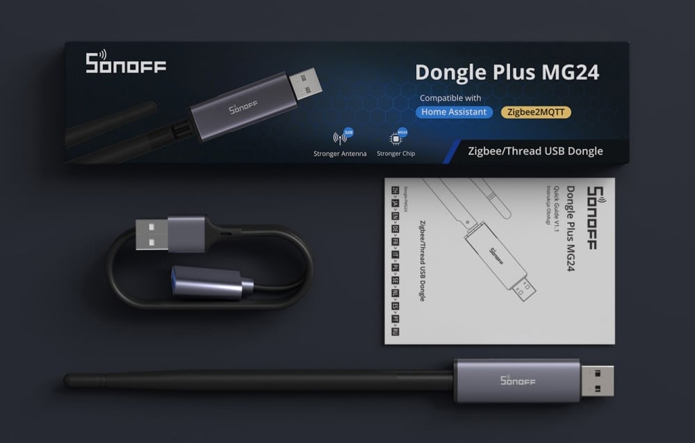ZigBee Sonoff gateway with kit contents and packaging on dark background.