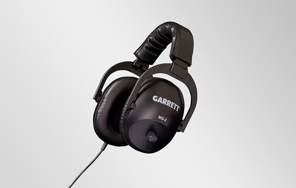 Garrett MS-2 headphones with black ear cups and a soft headband against a light background.