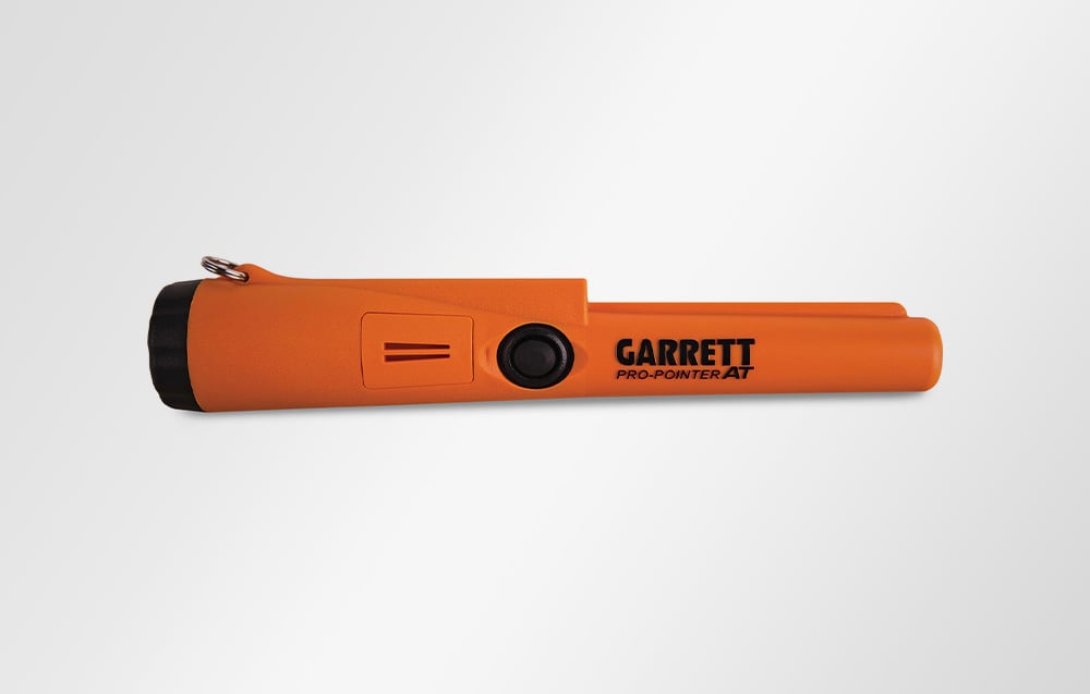 Garrett Pro-pointer AT Pinpointer detector on white background, side view.