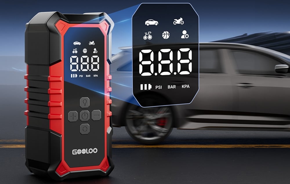 GOOLOO compressor with a digital display against the backdrop of a moving car