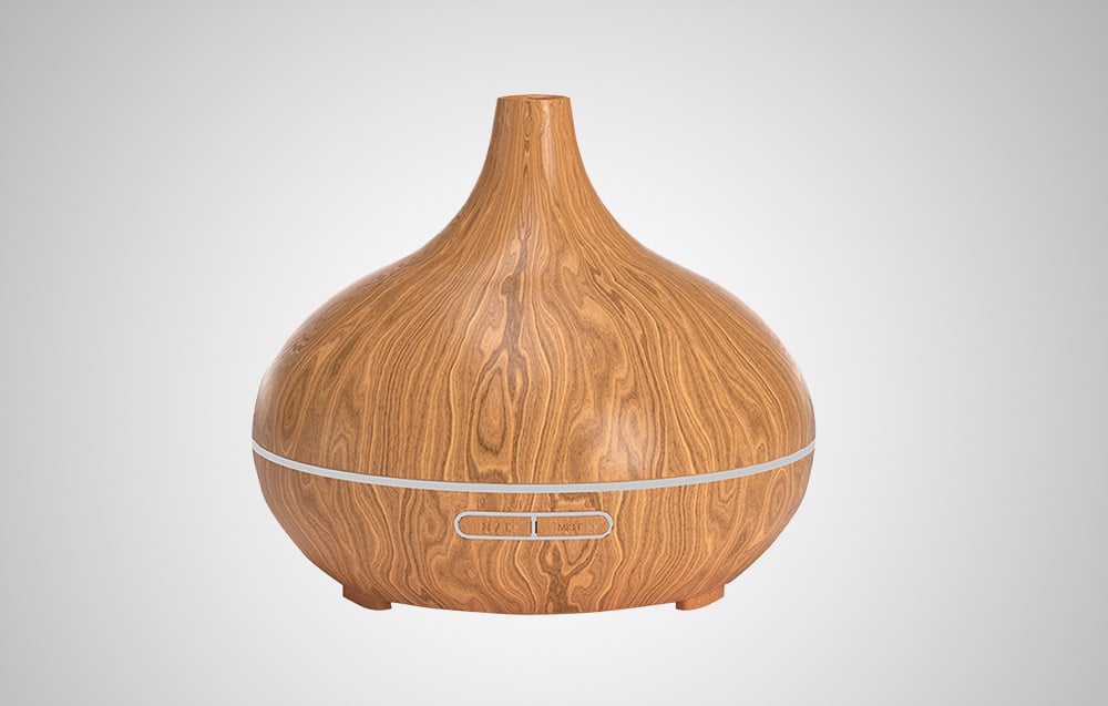 Single oil diffuser with wooden texture and illuminated stripe on white background