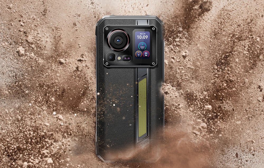 The back panel of a black HOTWAV dust-resistant smartphone shown in a cloud of swirling sand and dust.